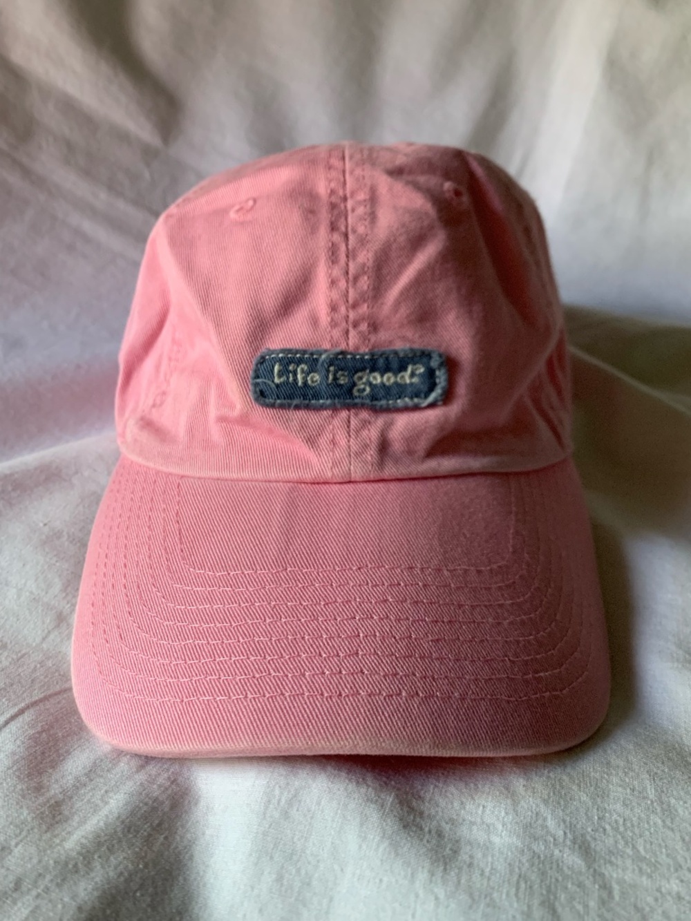 Life Is Good pink baseball cap with embroidered logo patch